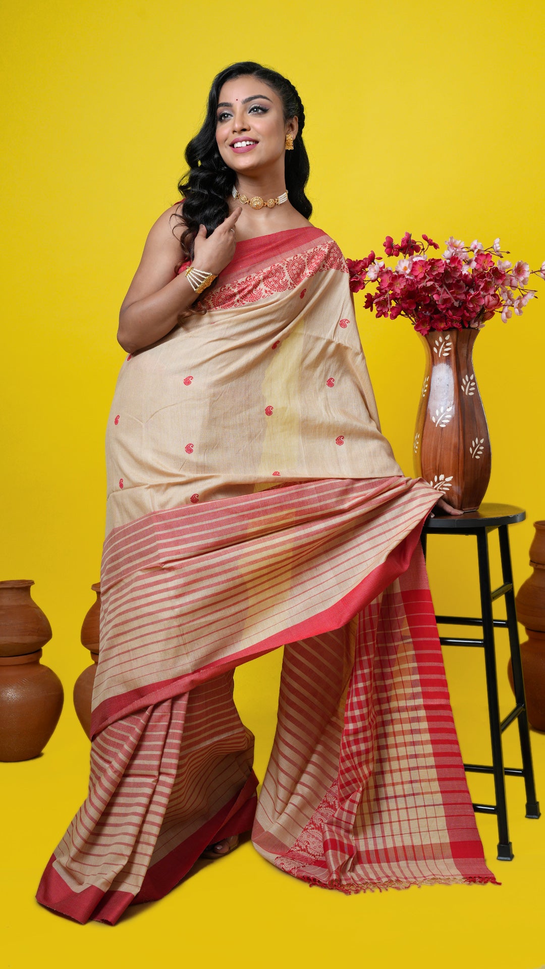 A tassar saree with red weave