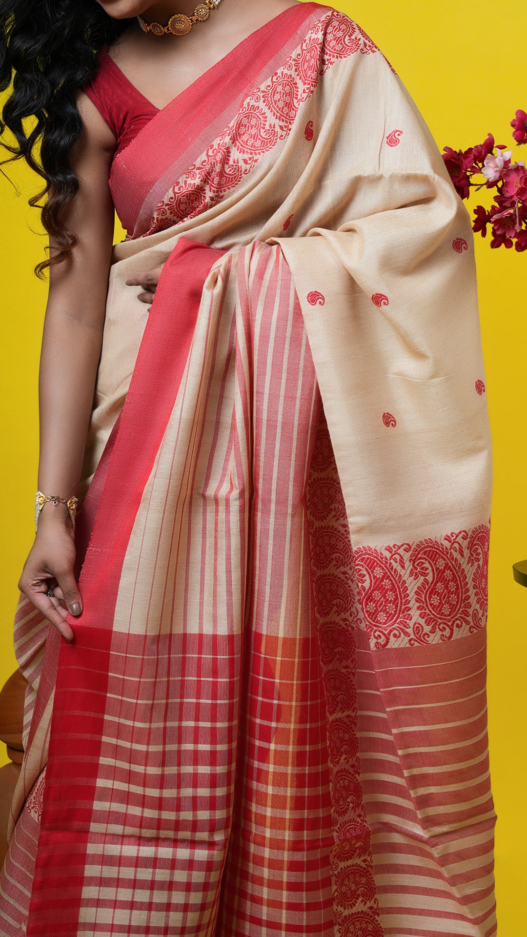 A tassar saree with red weave