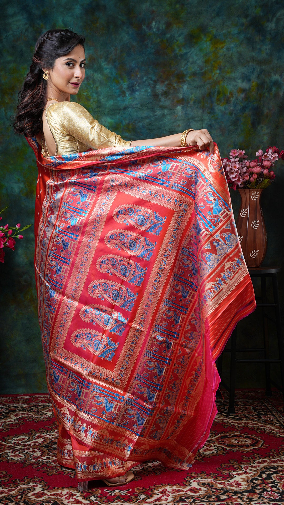 A flame coloured baluchari saree