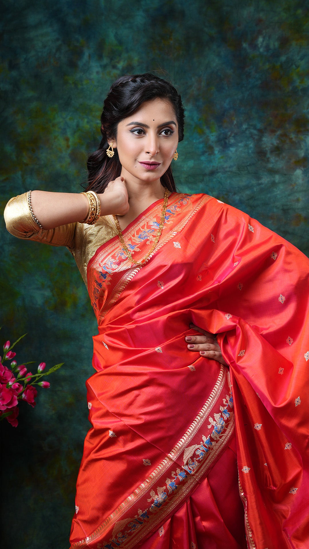 A flame coloured baluchari saree