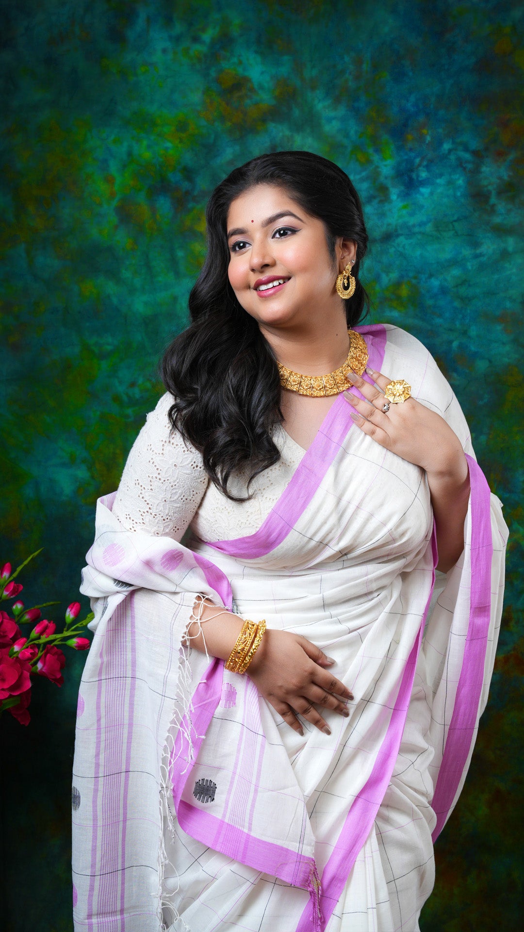 An off white check design saree