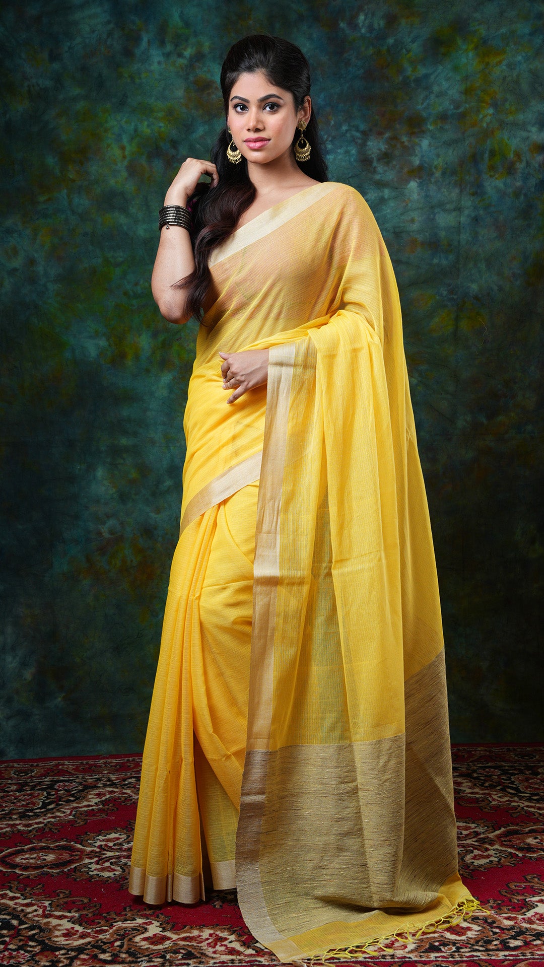 Canary yellow Tangail soft cotton saree with self stripes, flat tassar border, jute woven pallu. No butis. Price: Rs. 1700/-