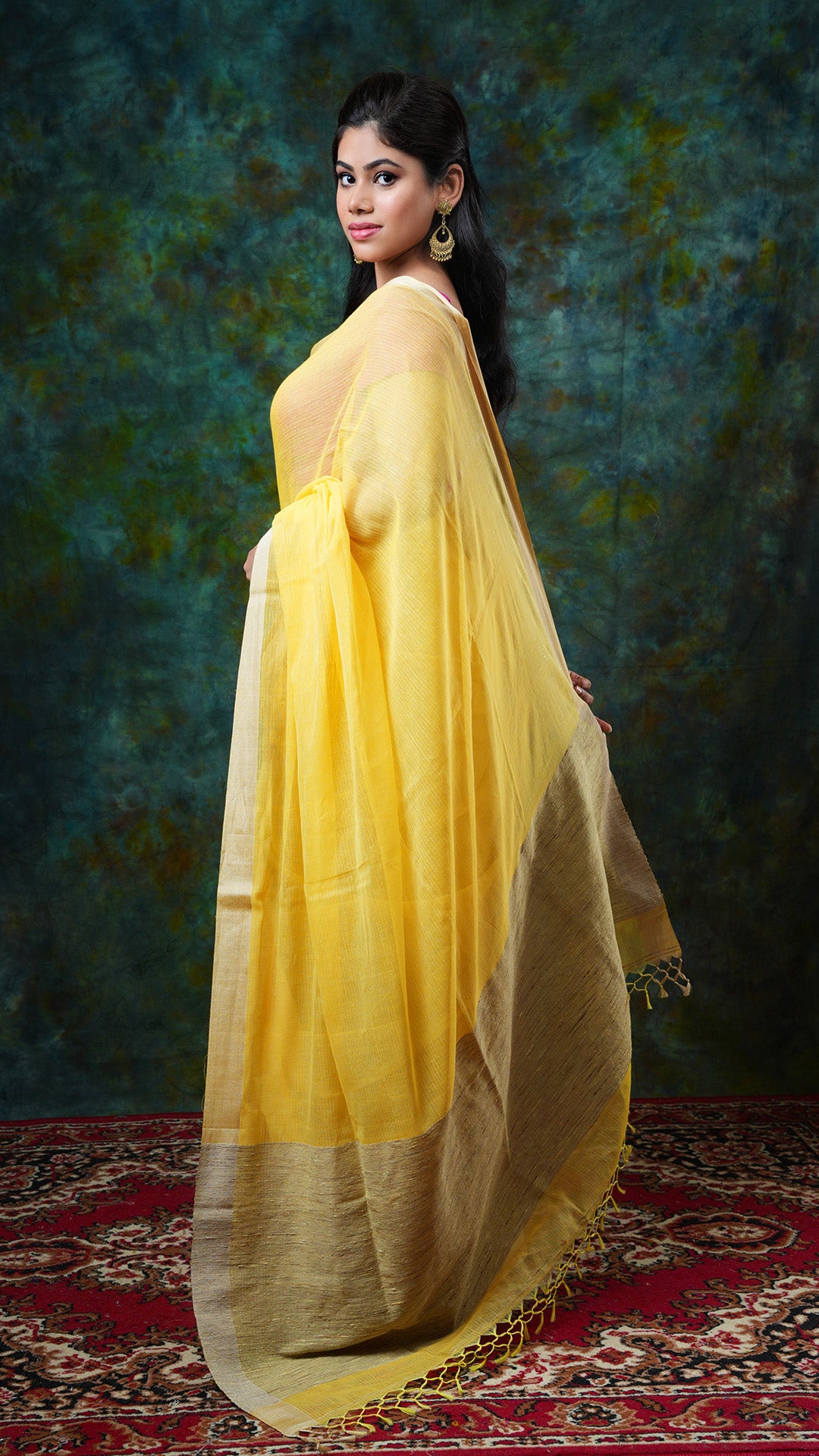 A canary yellow tangail saree