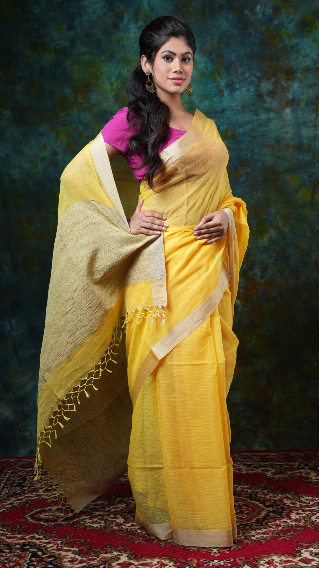 A canary yellow tangail saree