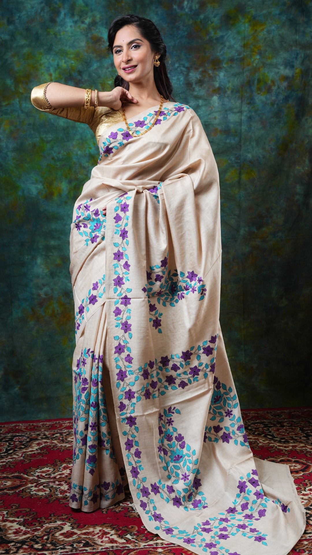 Kantha embroidered natural Tassar saree with blue and aubergine embroidery on pallu and border. Price: Rs. 17000/-