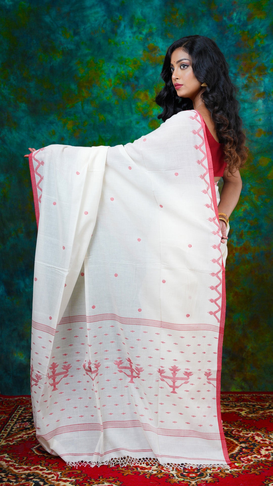 A off white and red dhakai saree