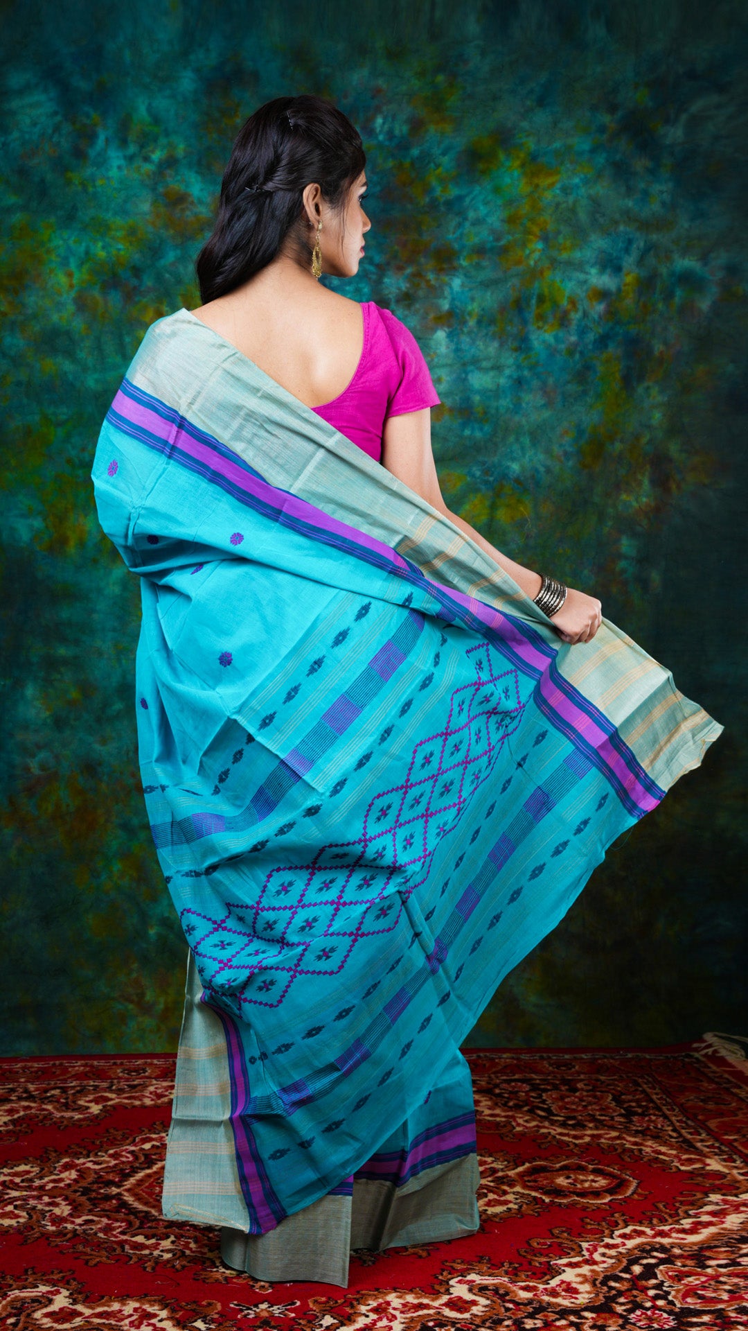 A deep firozi tangail saree