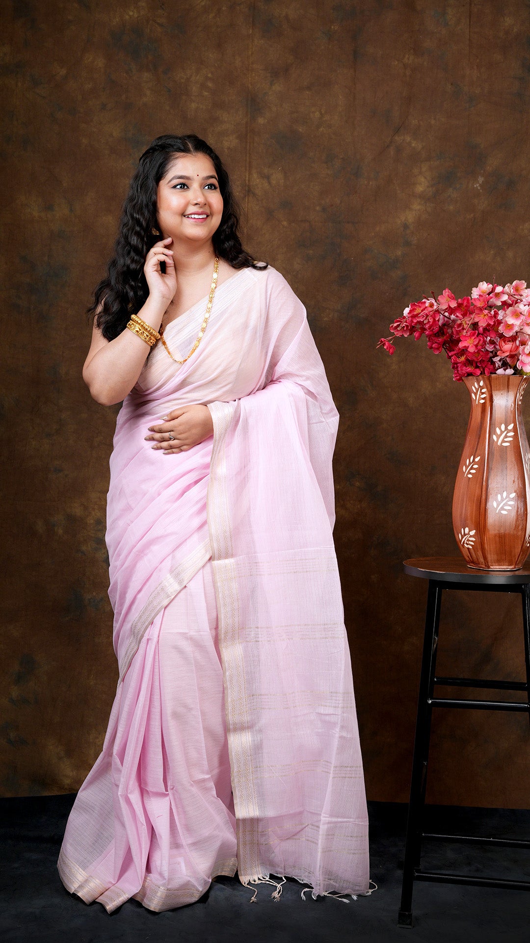 A light pink saree - A light pink saree with self stripes in the body and elegant design. This elegant Tangail saree, Tant saree, soft cotton saree is perfect for traditional occasions.