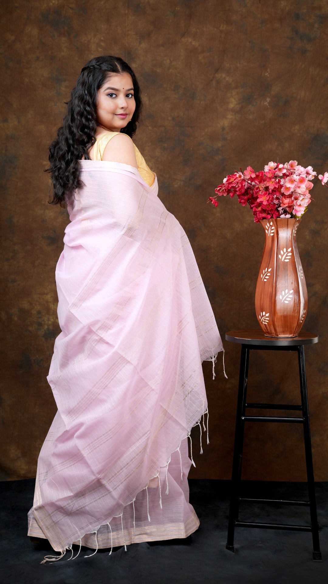 A light pink saree