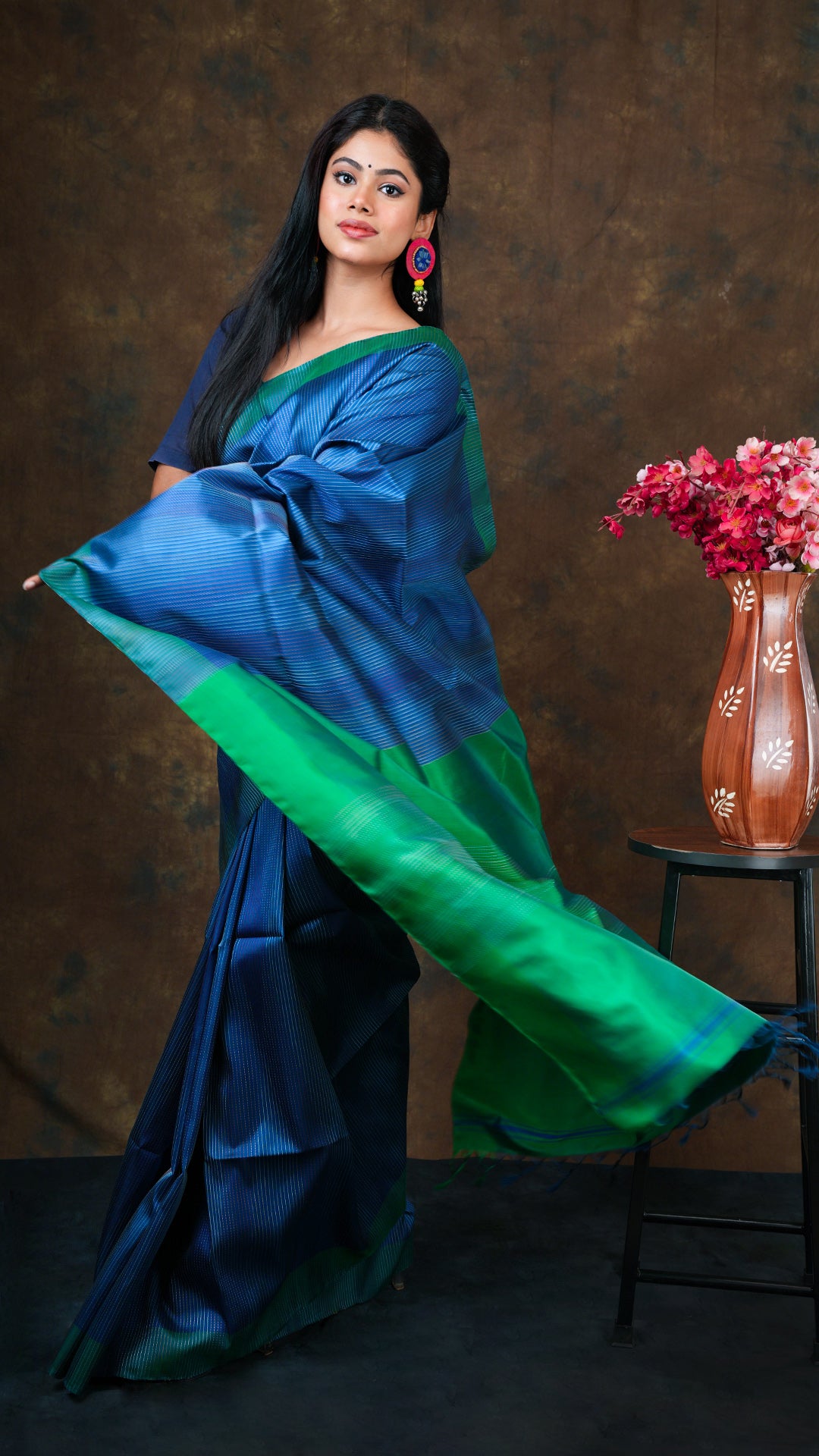 A blue and green silk saree