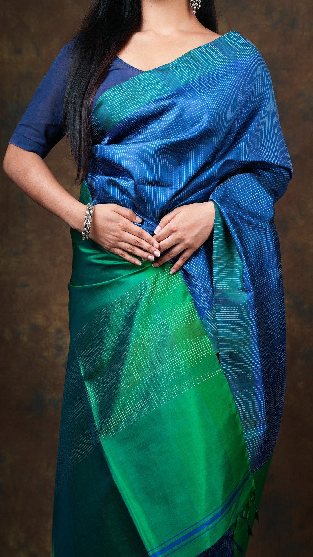 A blue and green silk saree