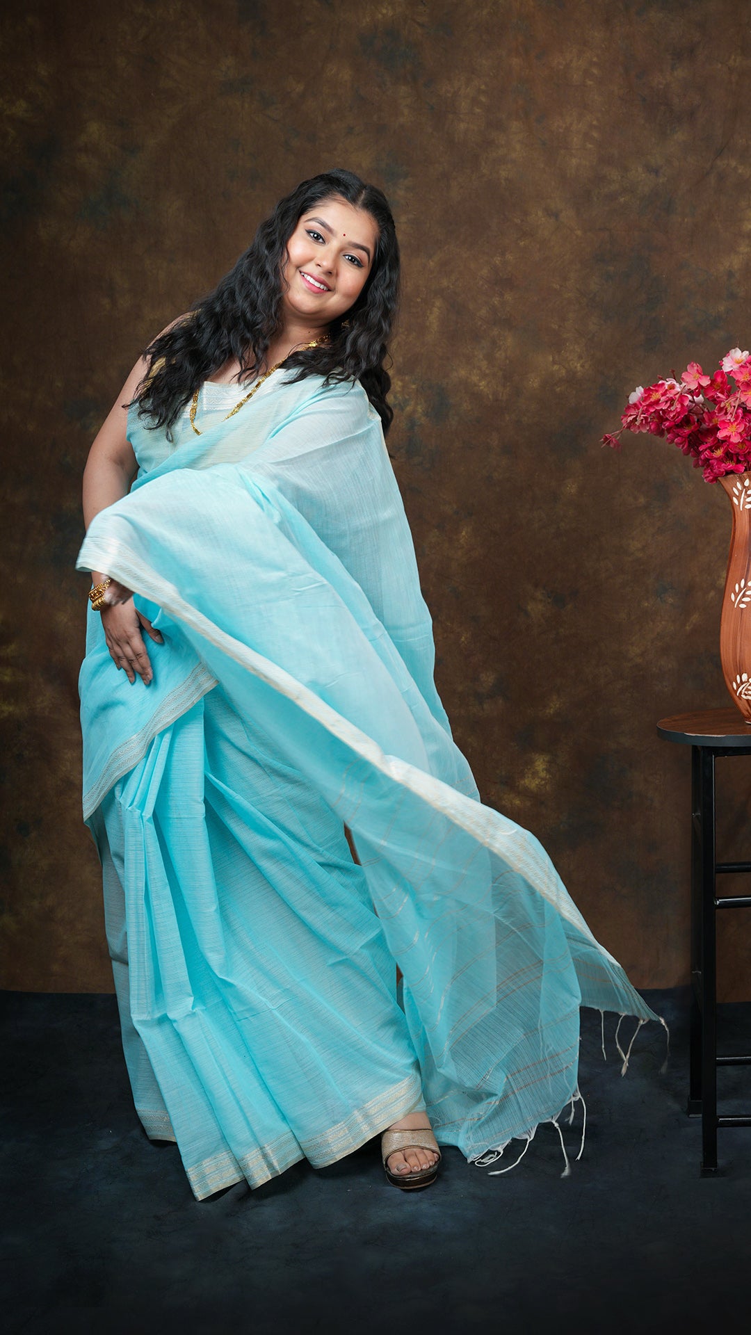 A firozi coloured tangail saree