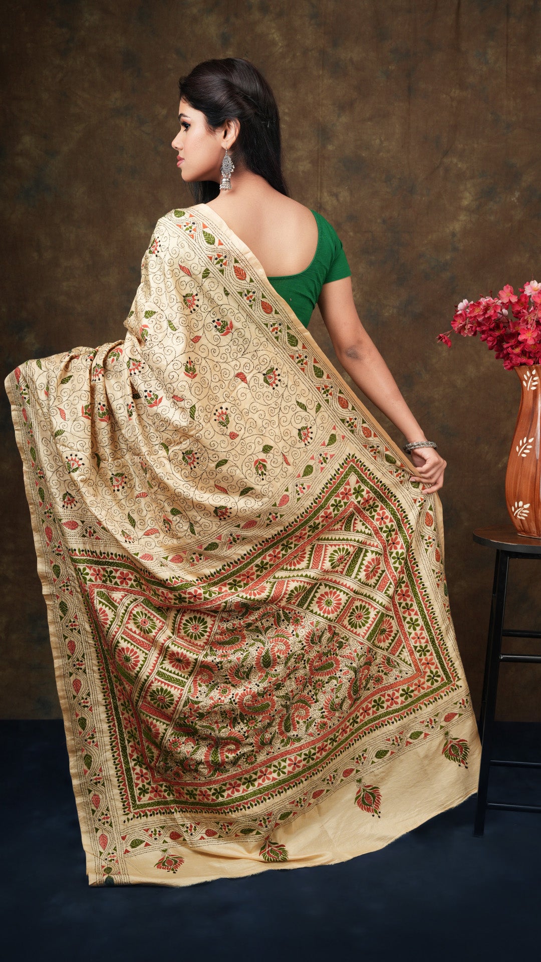 A kanta saree in dark beize colour