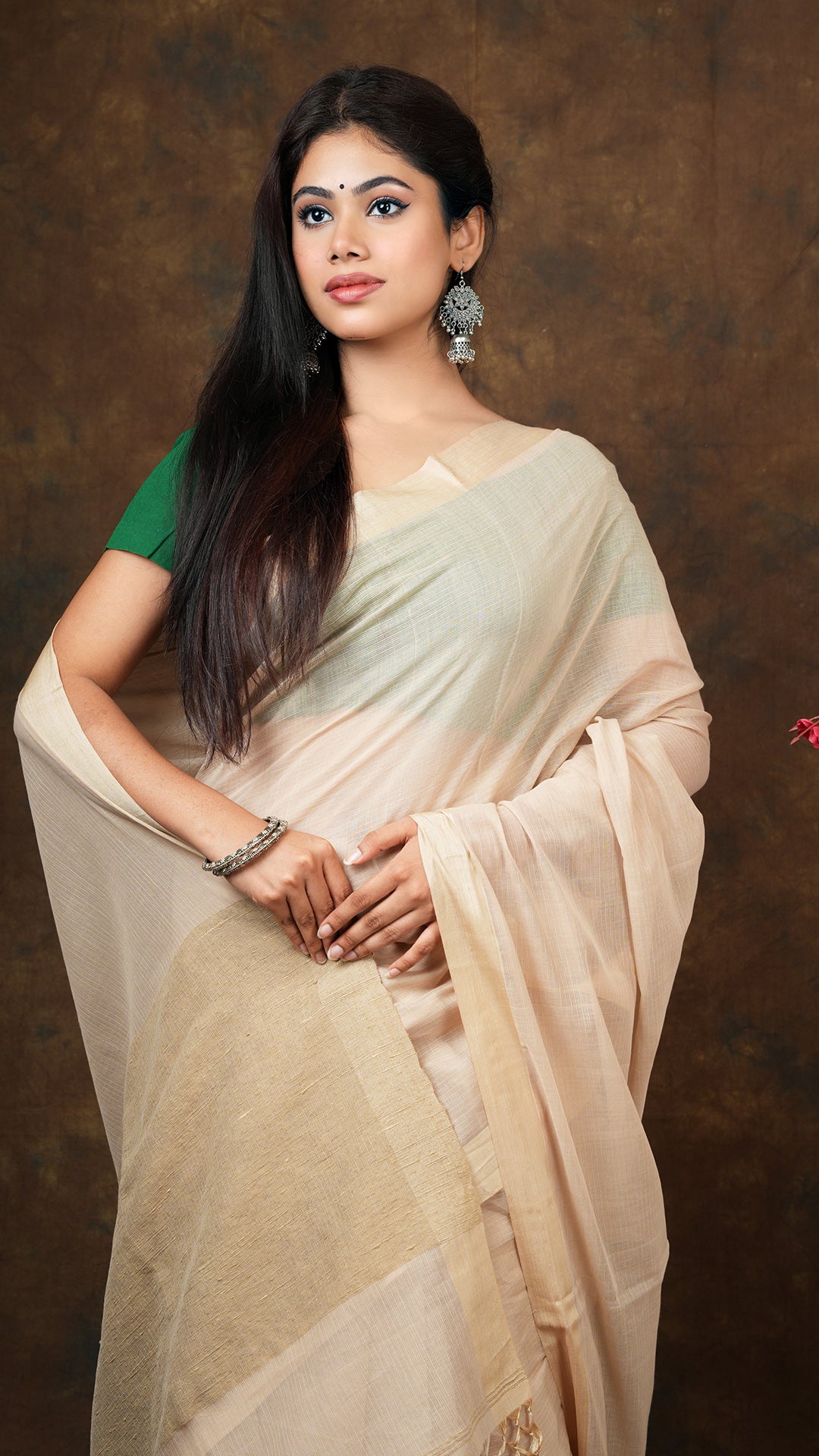 A beize saree with tassar border