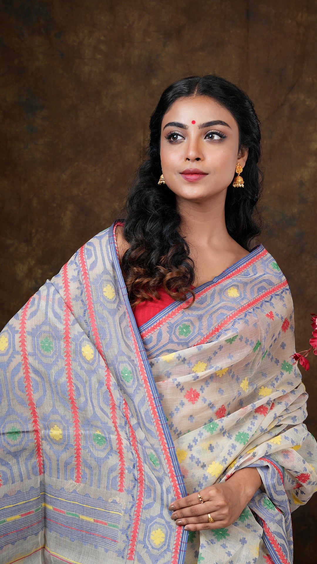 A blue multi coloured cotton jamdani saree