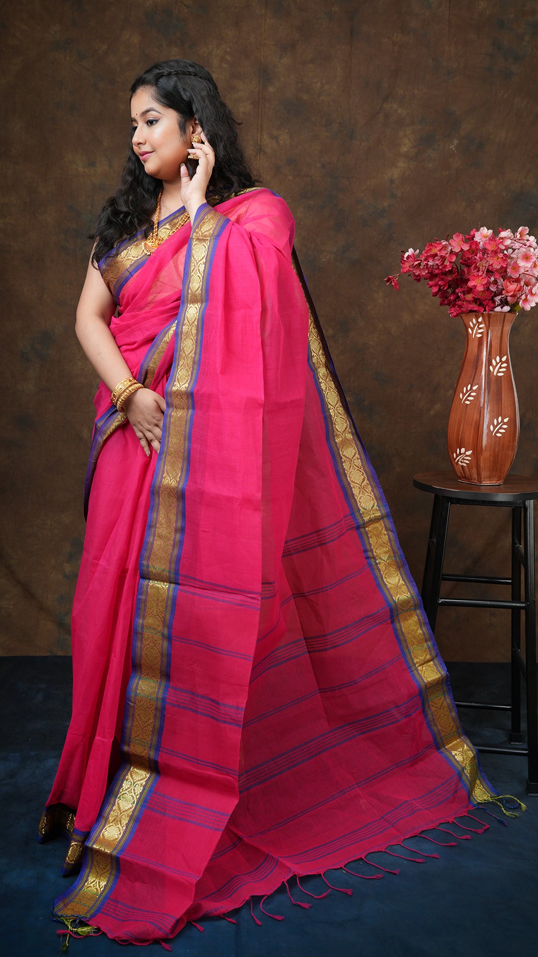 A dark rani tangail saree