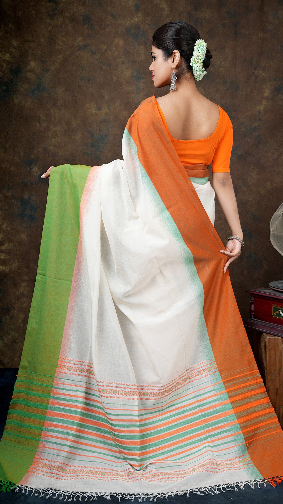An off white with orange and green combination