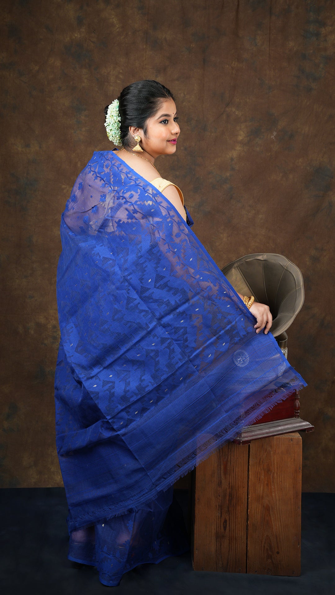 A dark blue jamdani saree