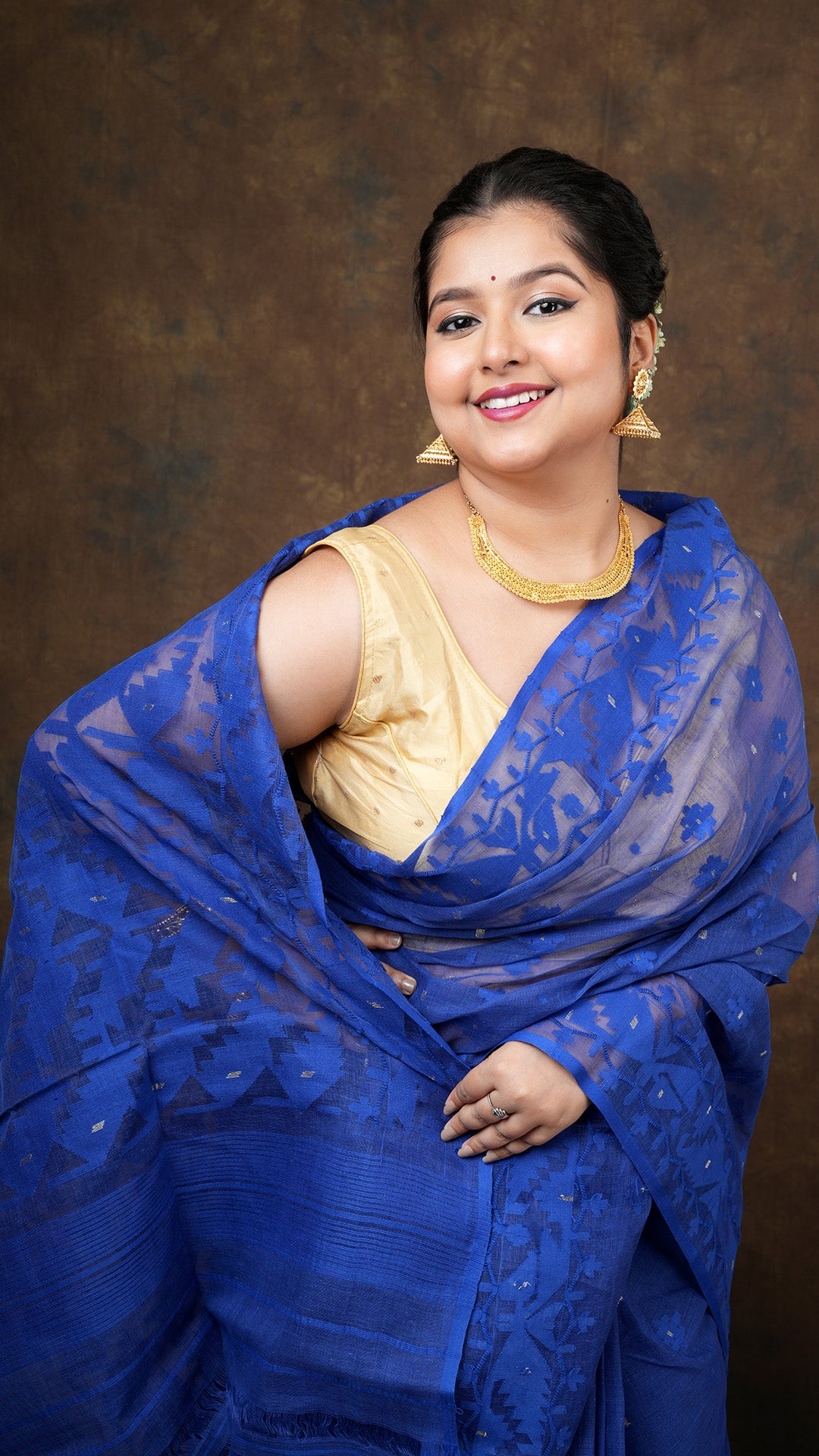 A dark blue jamdani saree
