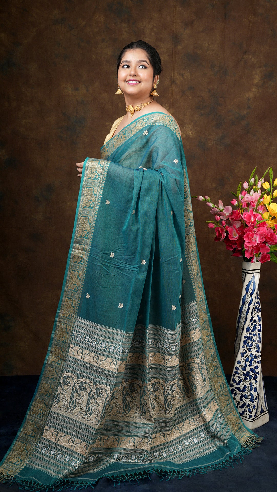 A dual tone green colour saree