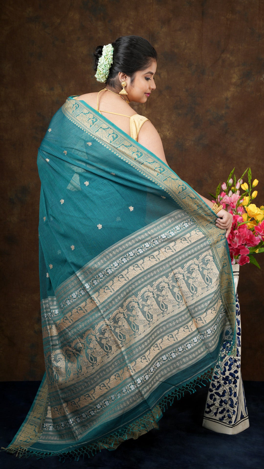 A dual tone green colour saree