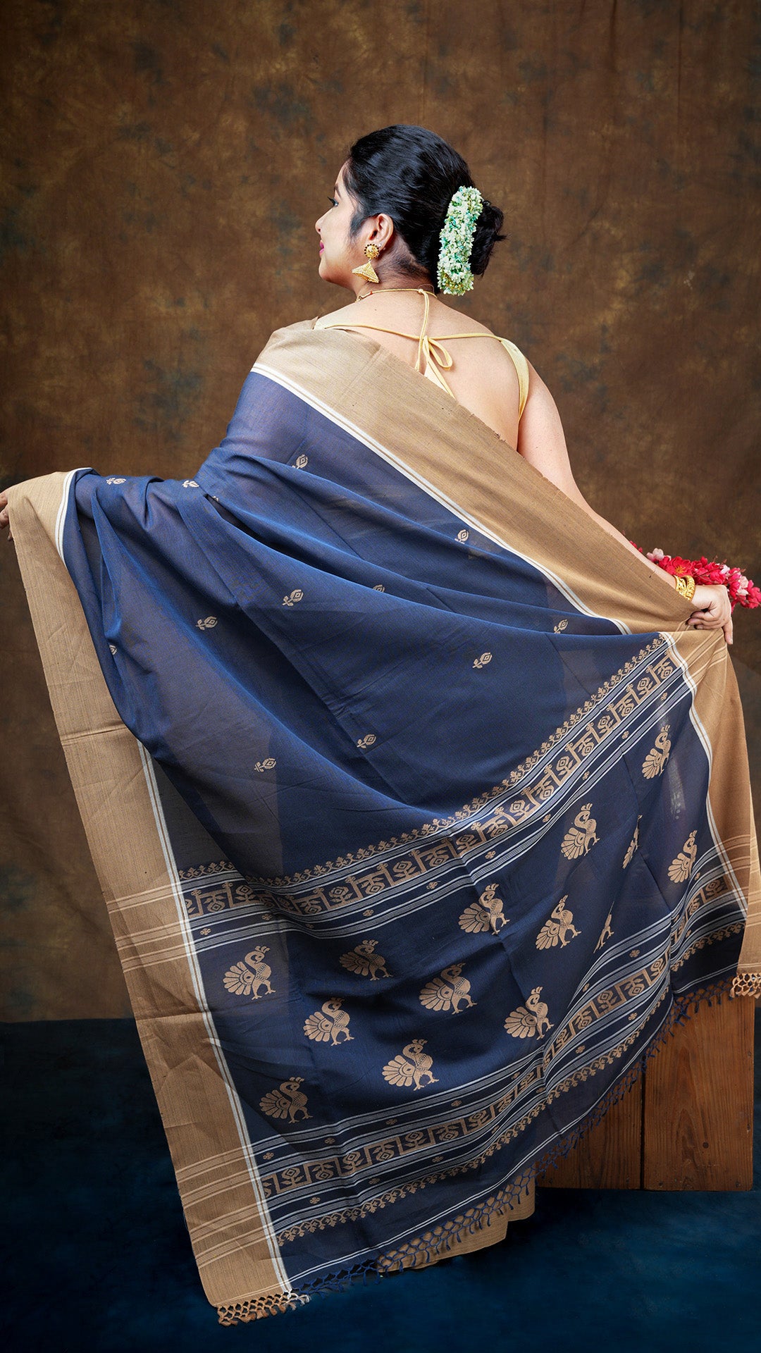 A navy blue tangail saree
