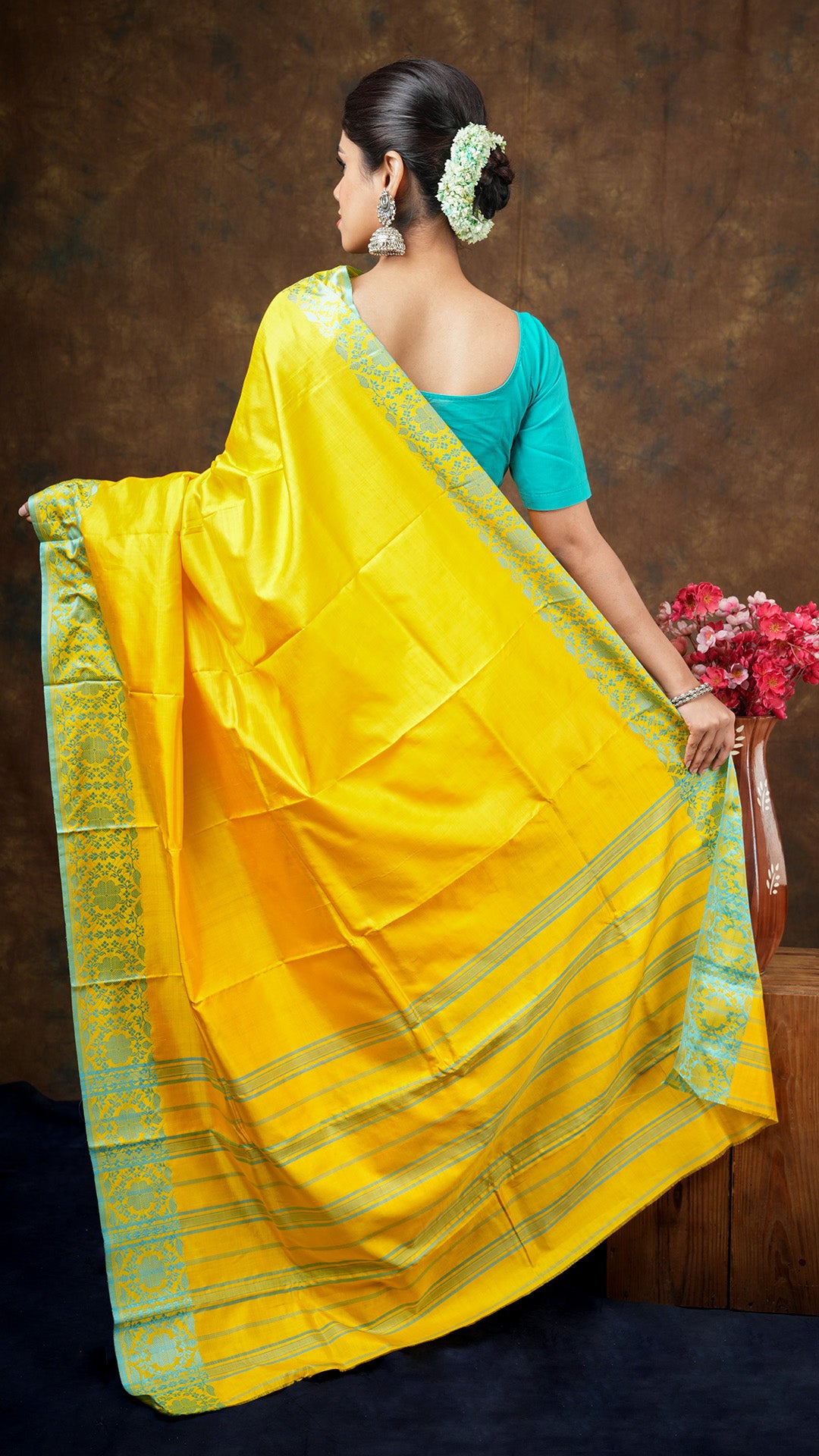 A yellow silk saree