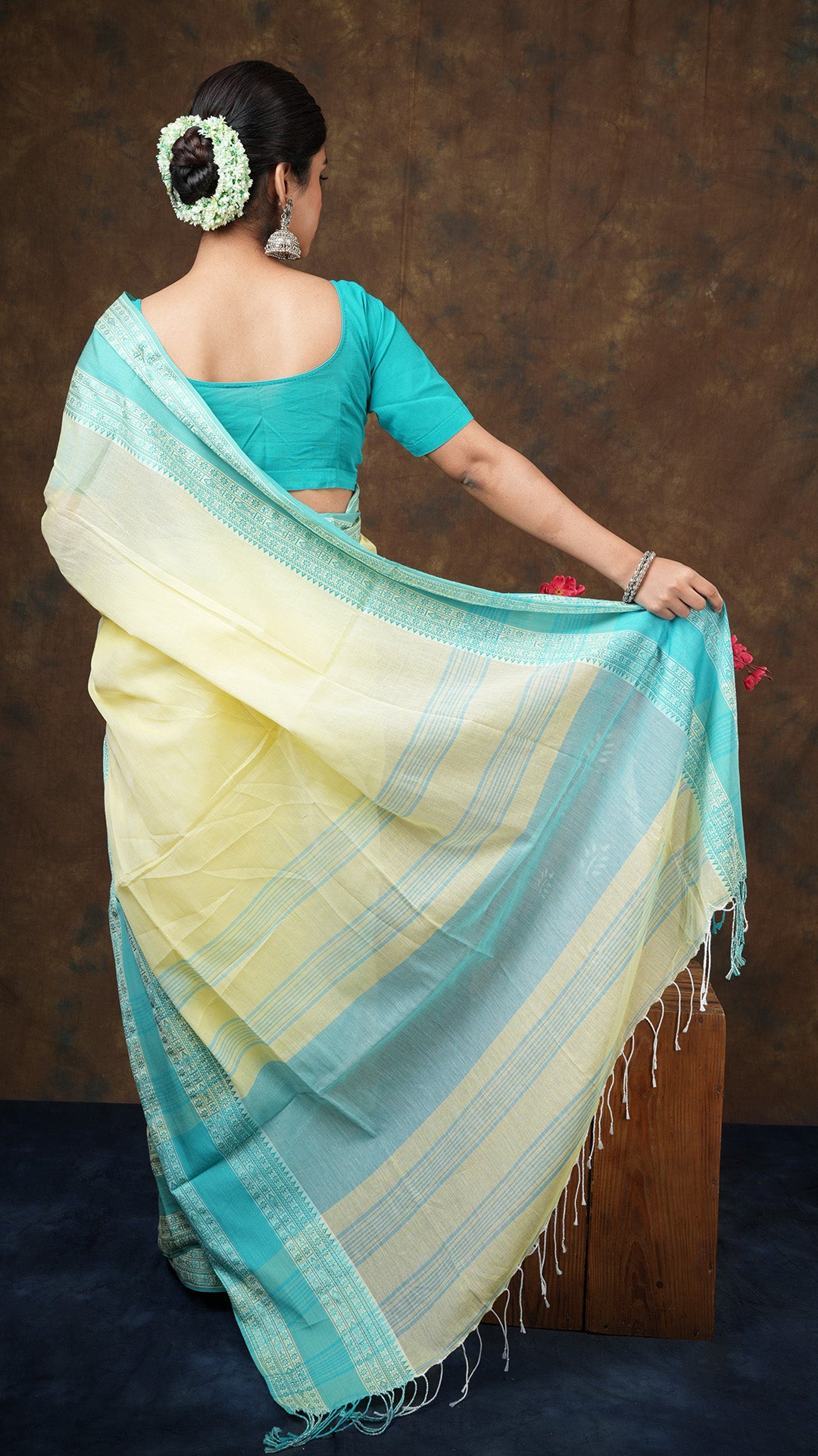 A lemon yellow saree