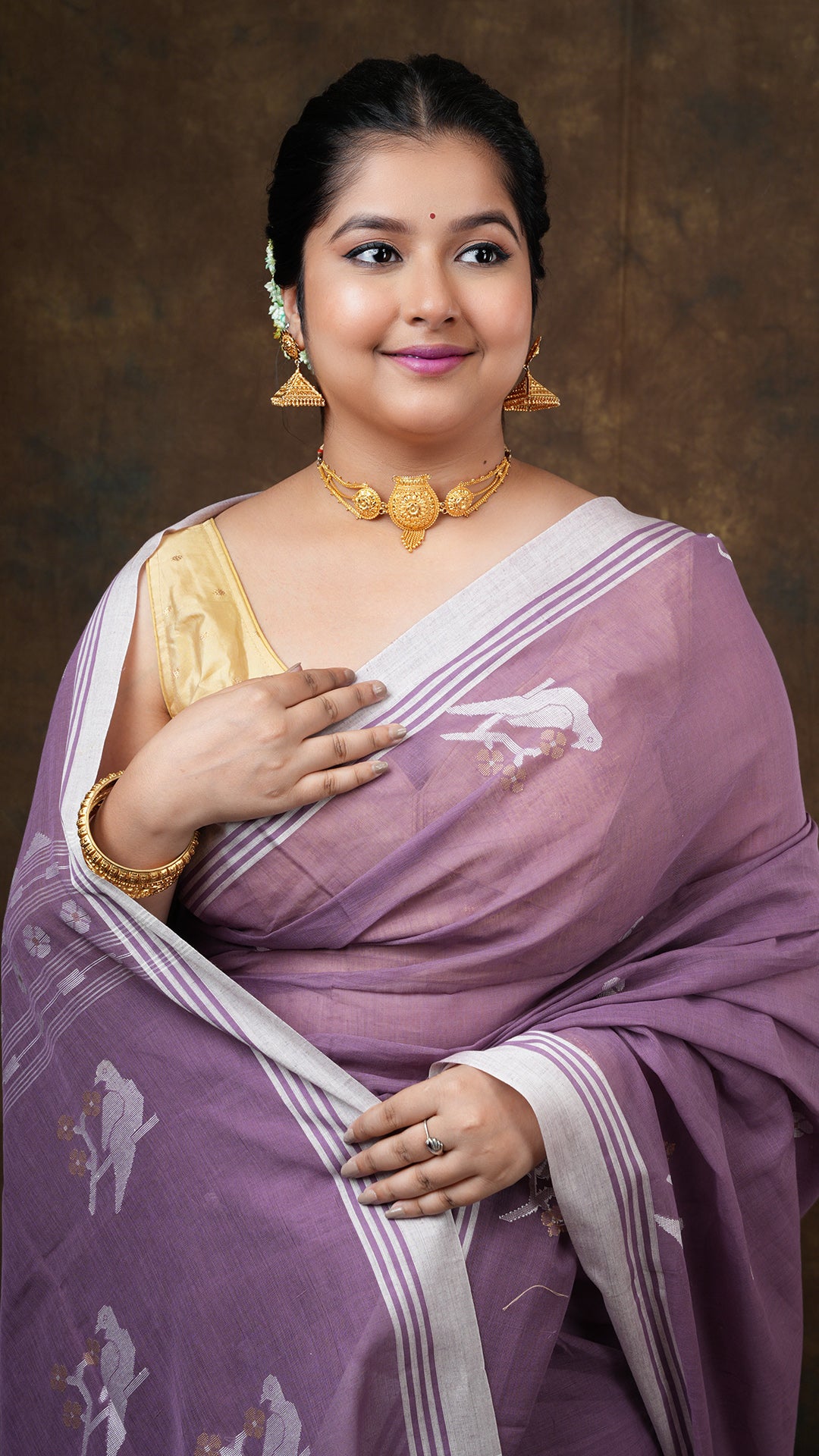 A deep mauve tangail saree