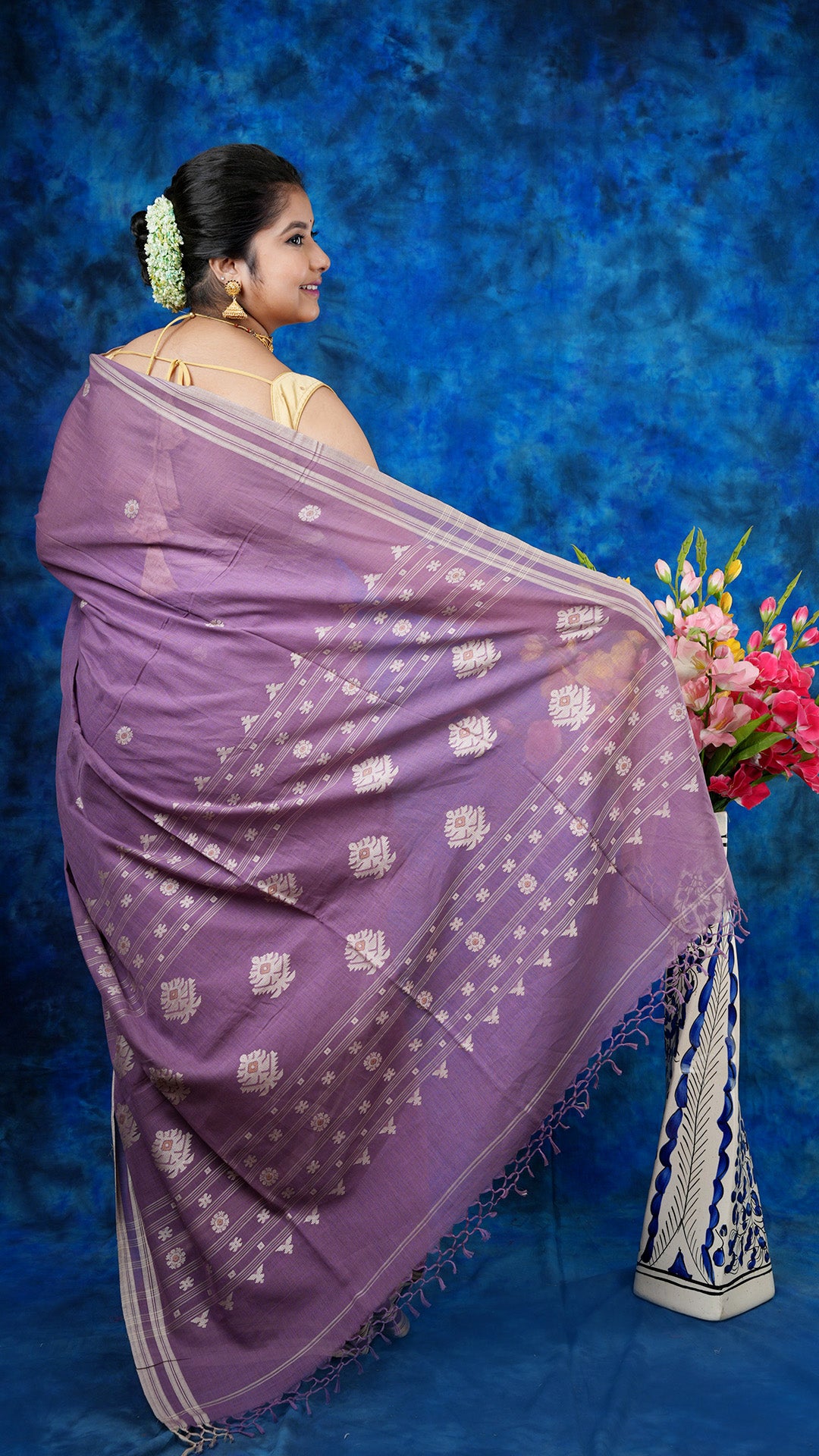 A deep mauve with beize saree
