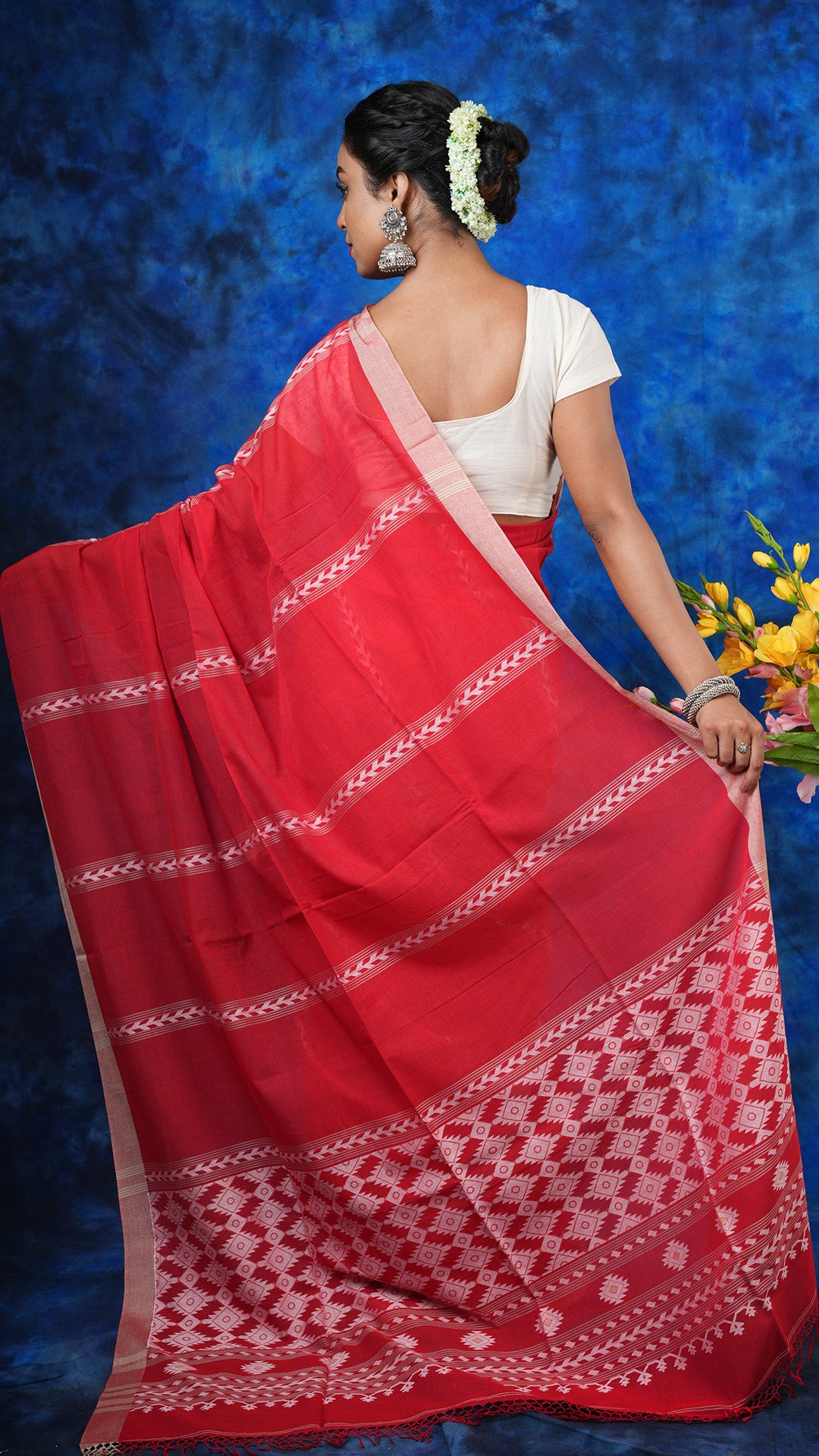 A red colour soft cotton saree