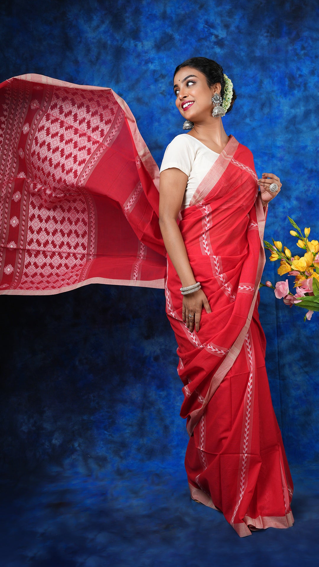 A red colour soft cotton saree
