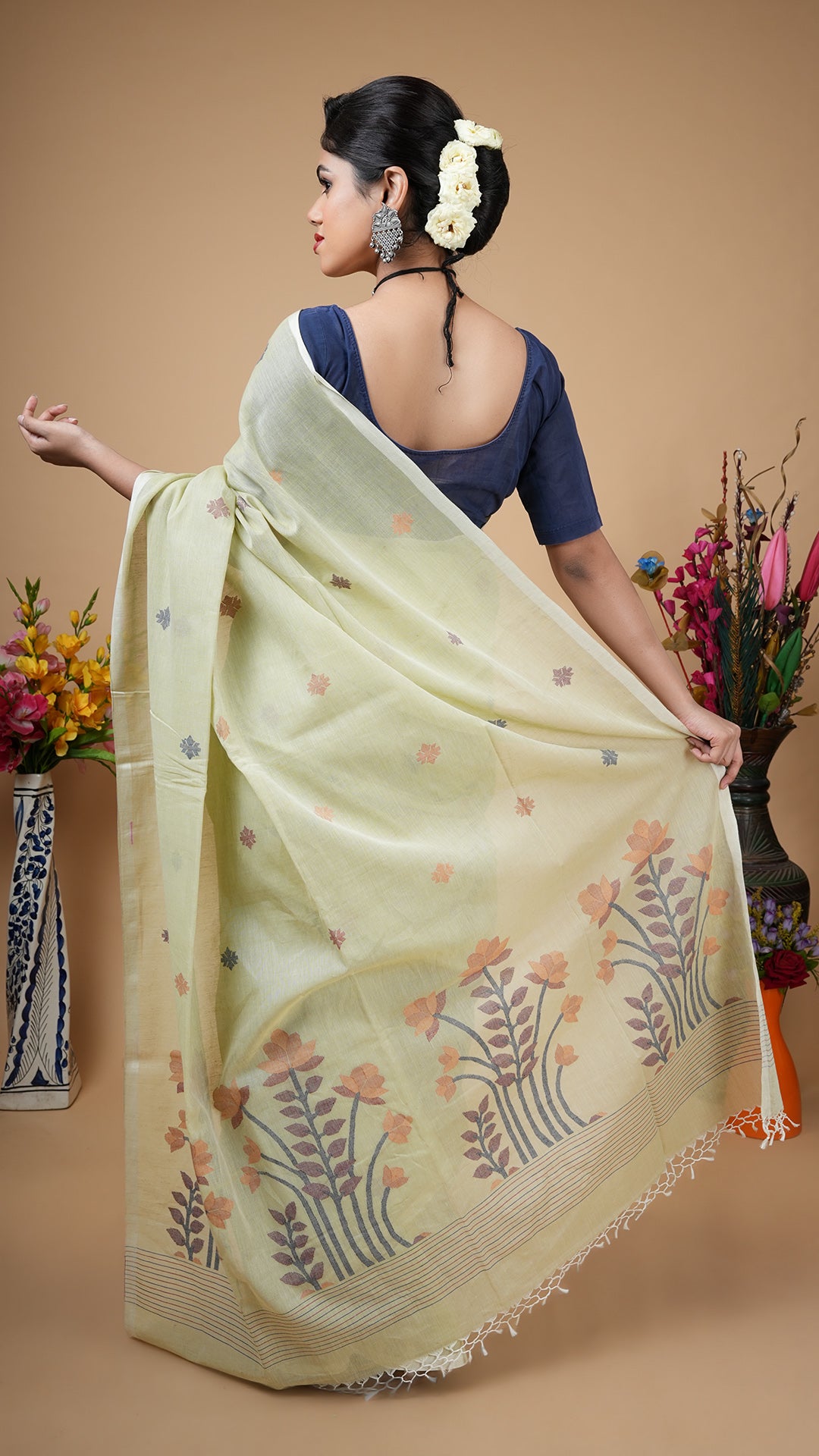 A pale pesta dhakai saree