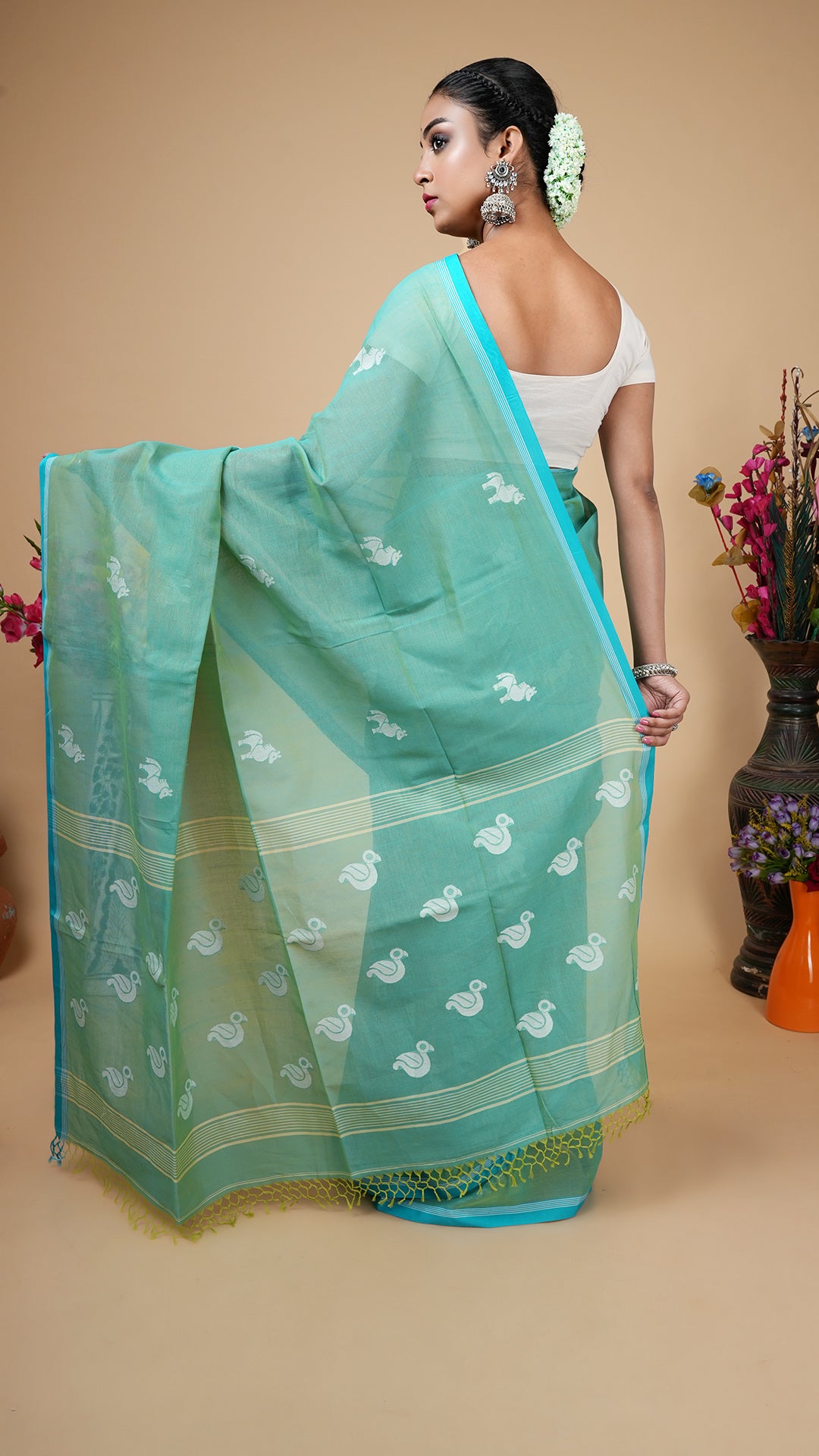 A dual tone green saree