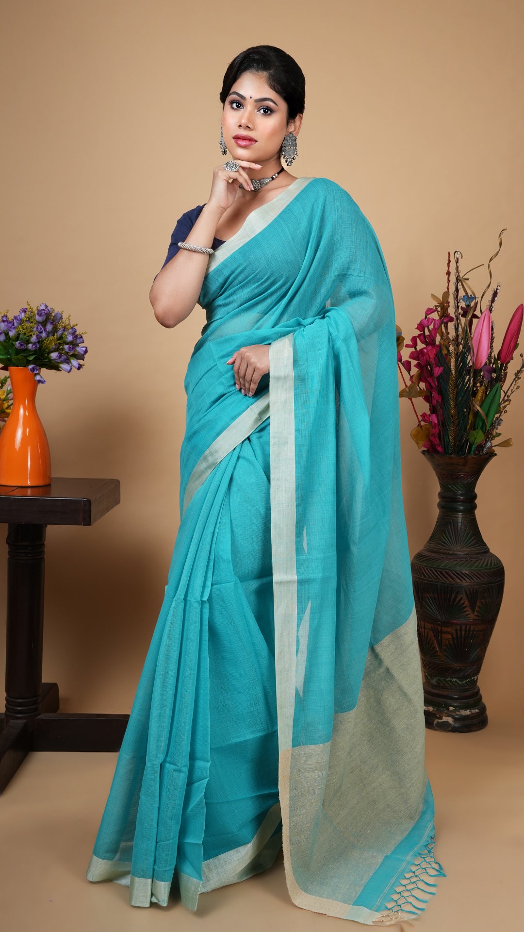 A sea green tangail saree