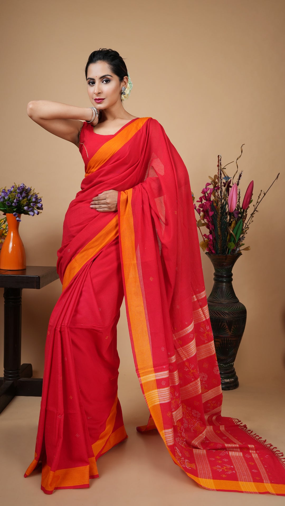 Red tangail soft cotton saree with yellow flat border, yellow-white woven butis and pallu. Great festive or wedding saree.