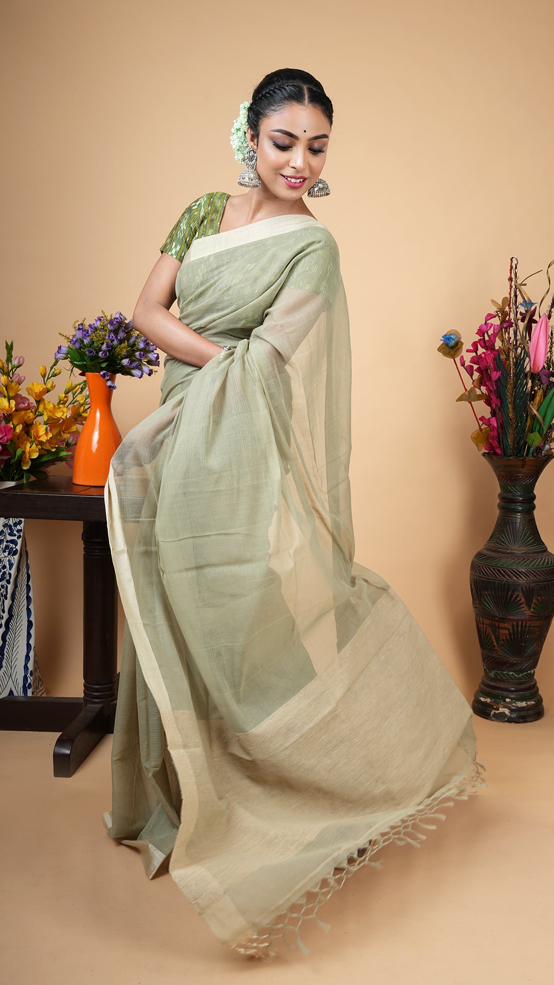 Pale pesta soft cotton tangail saree with flat tassar border, self stripes and jute woven pallu. Subtle daily wear saree.