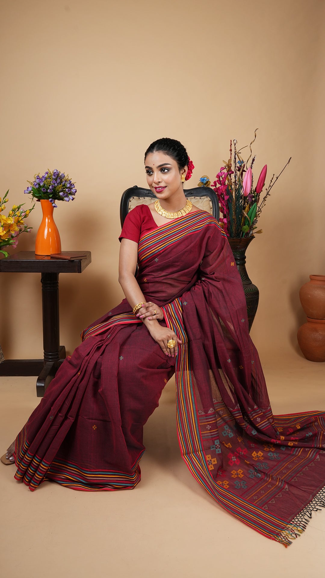 A soft tangail saree in short maroon colour