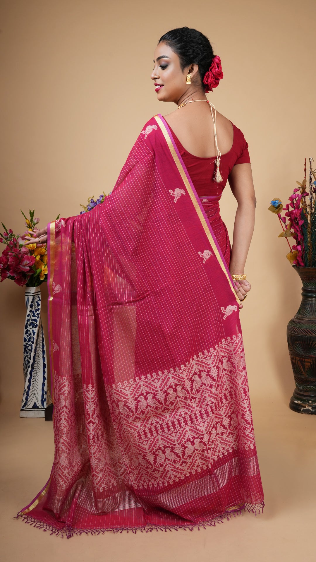 A tangail saree in maroon colour