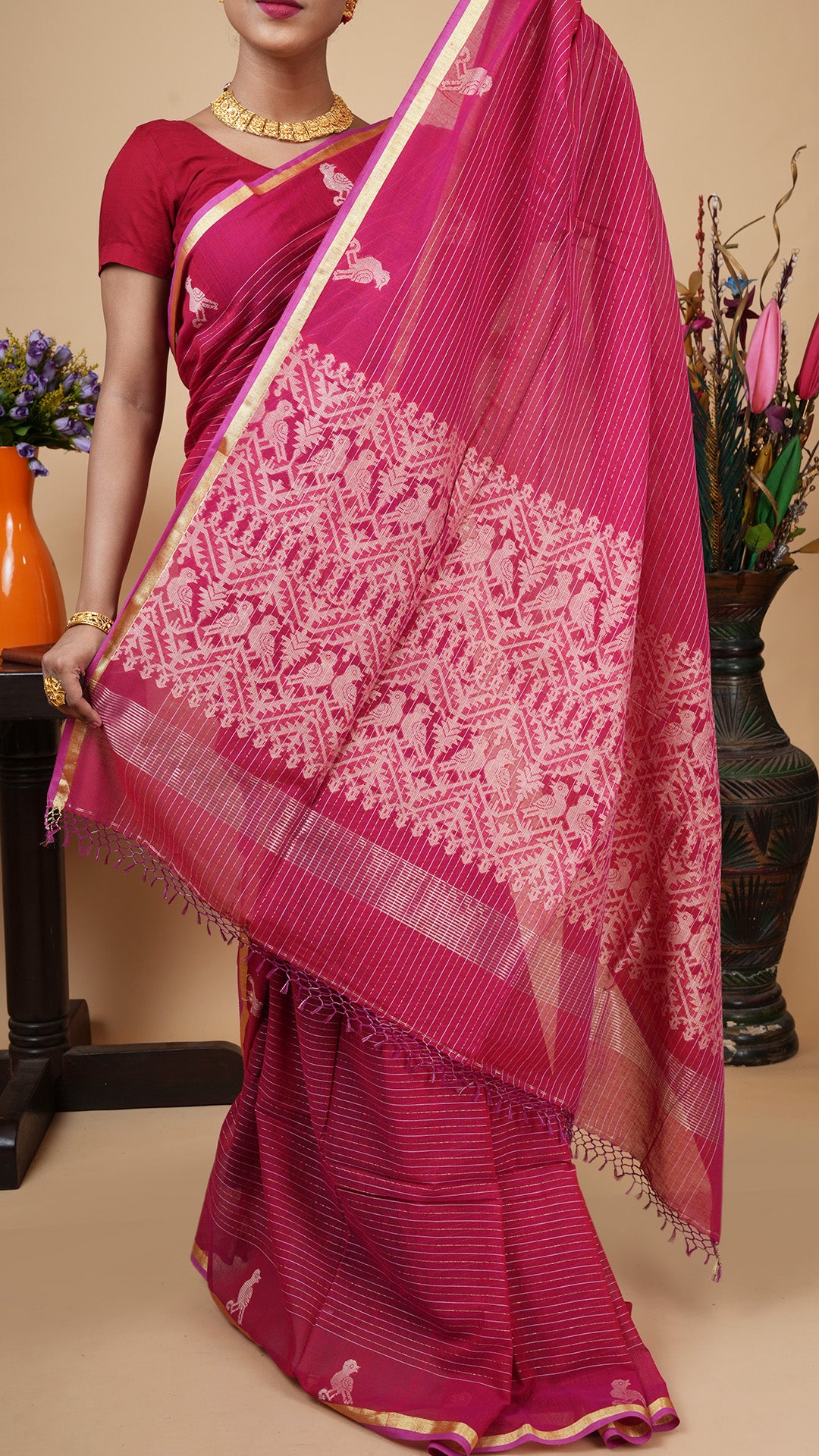 A tangail saree in maroon colour