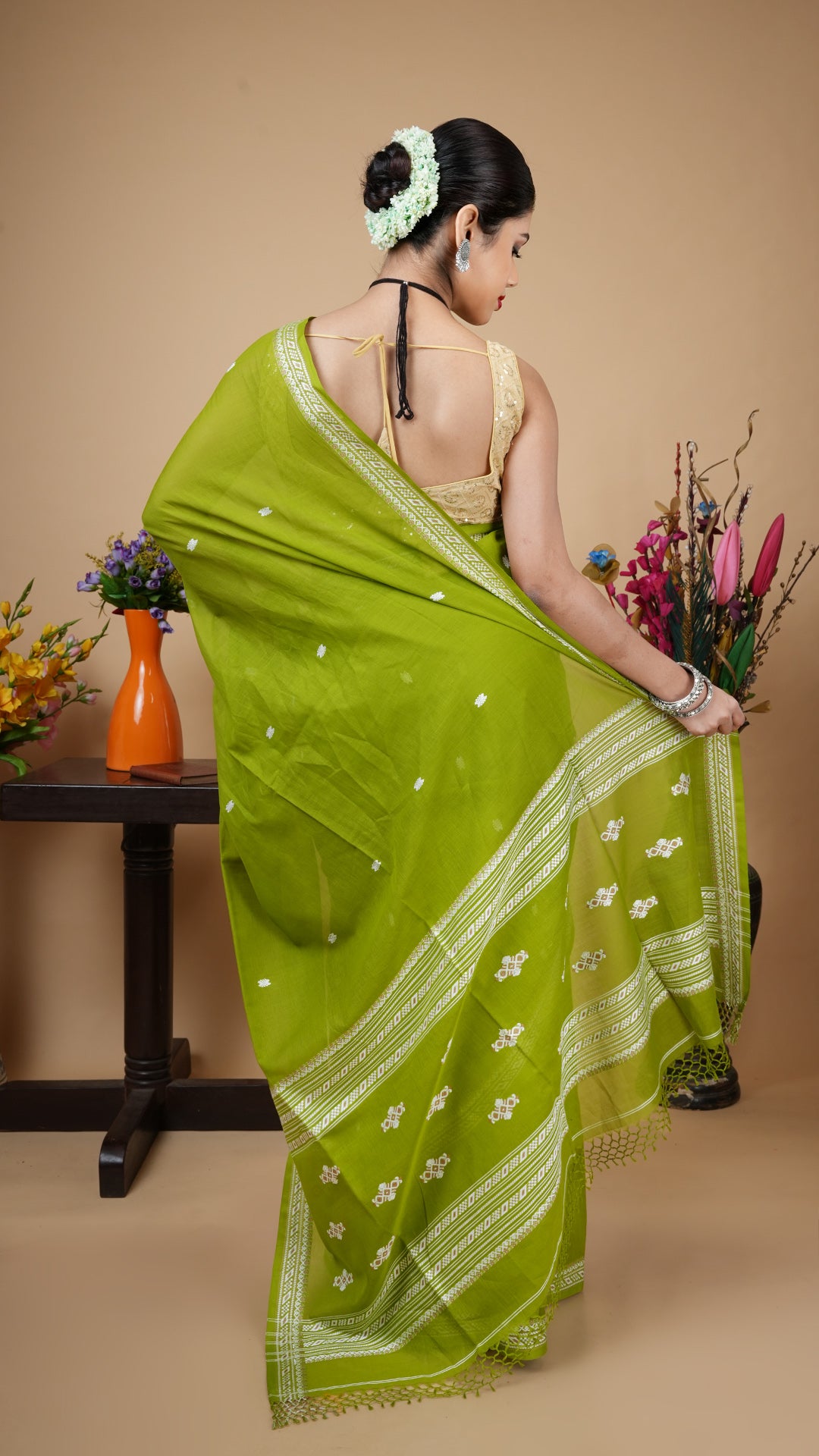 A tangail saree in mehendi green colour