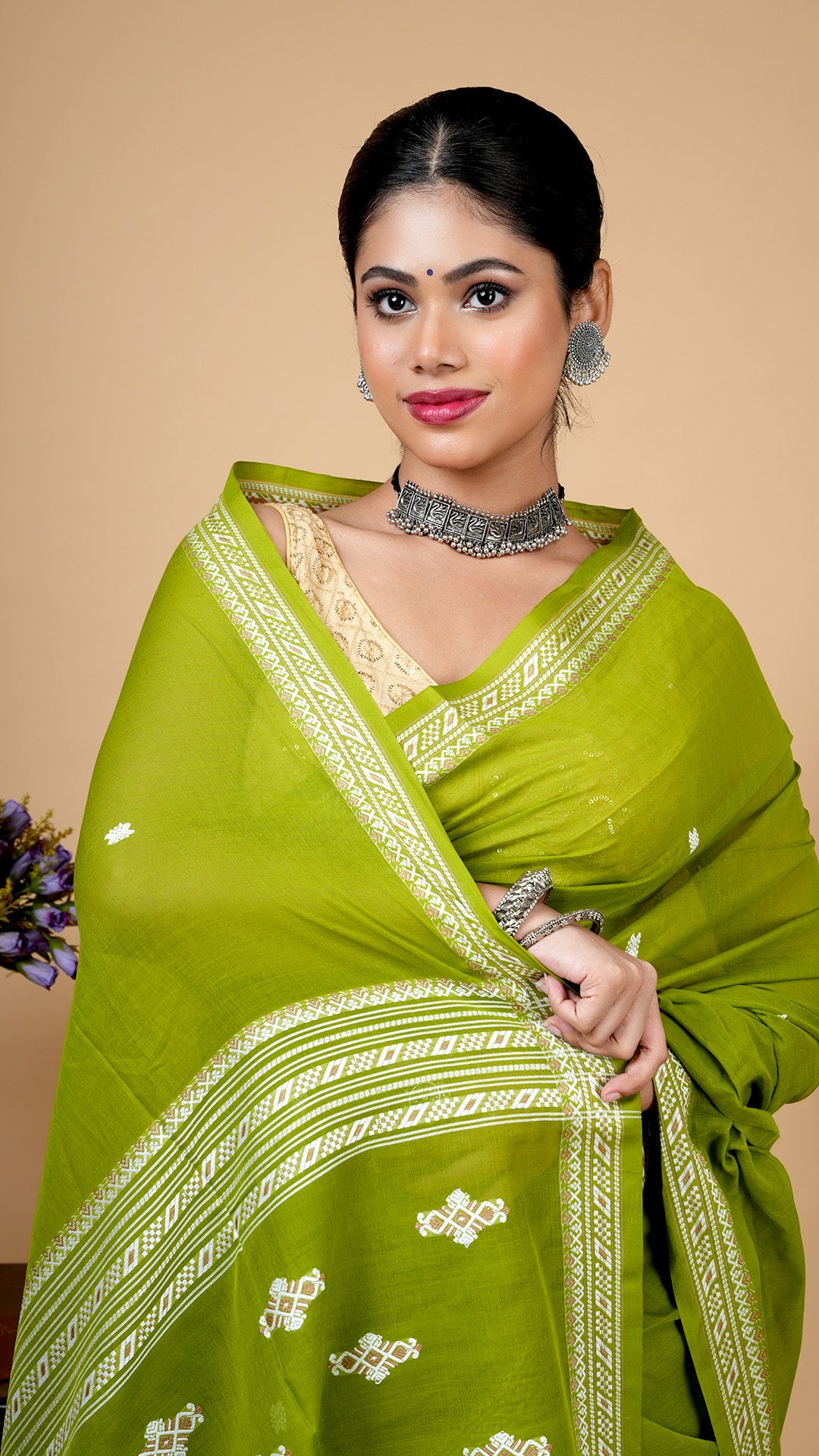 A tangail saree in mehendi green colour